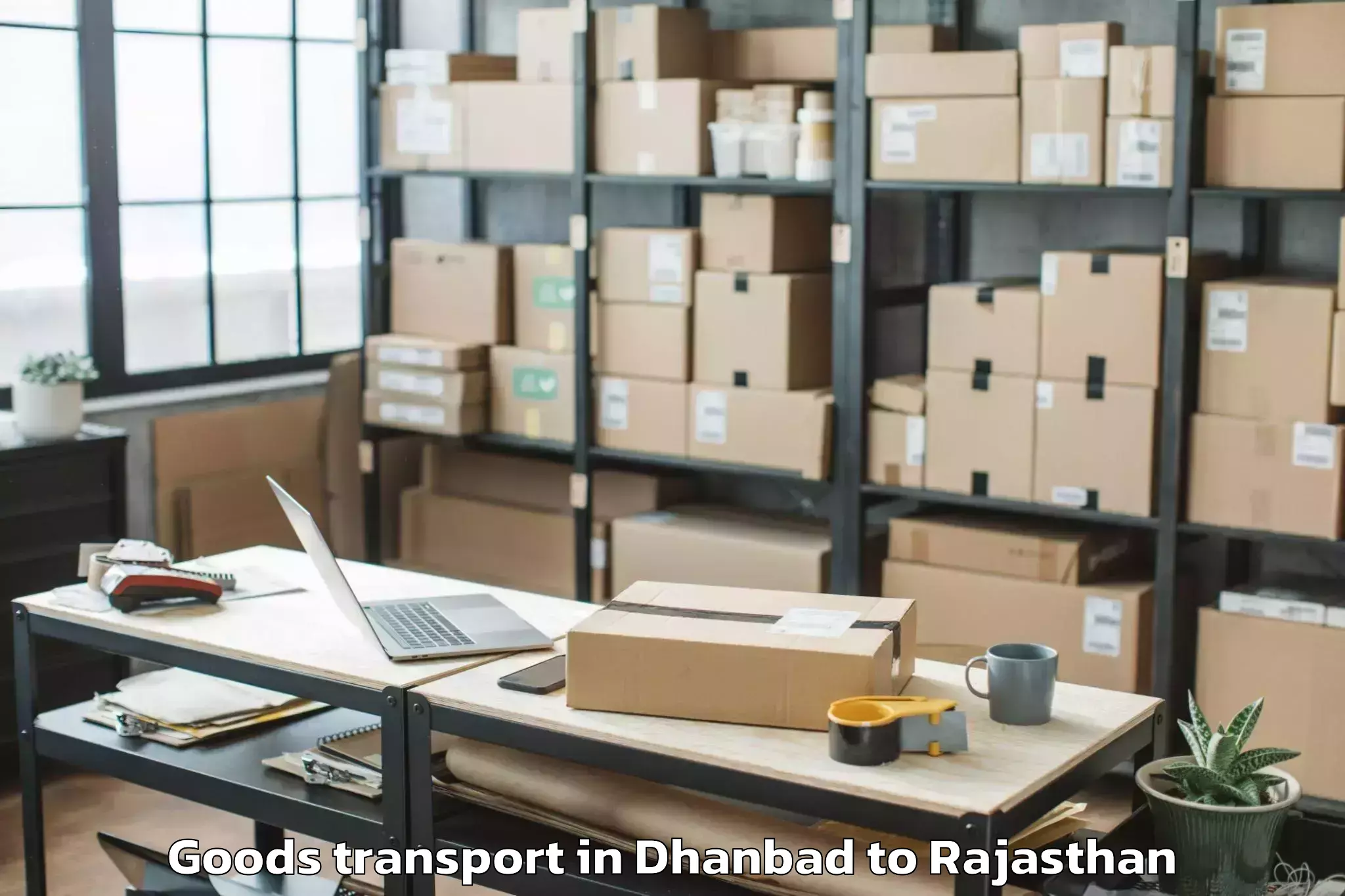 Easy Dhanbad to Madanganj Kishangarh Goods Transport Booking